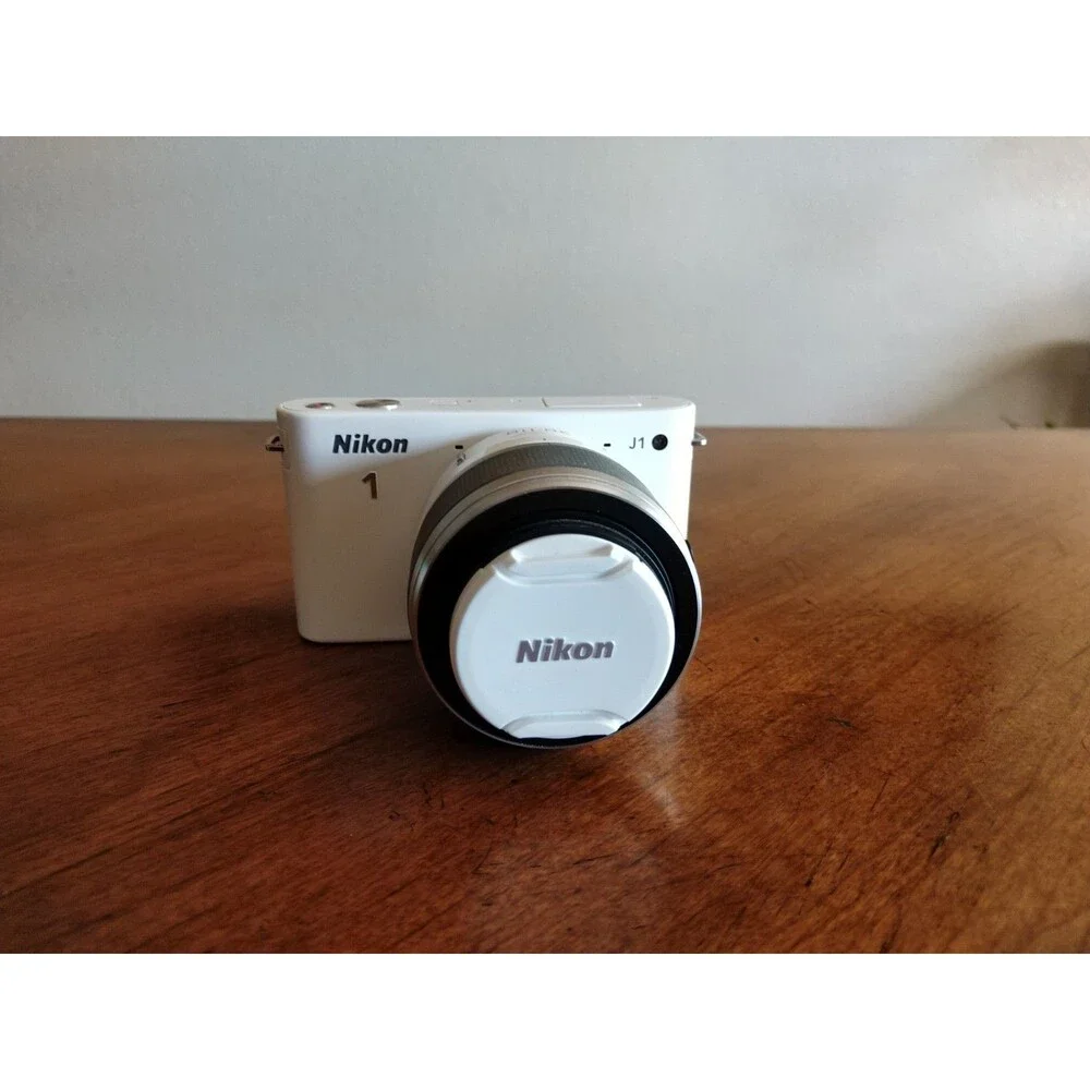 READ* Nikon 1 J1 White Digital Camera with 1 NIKKOR 10-30mm VR Lens